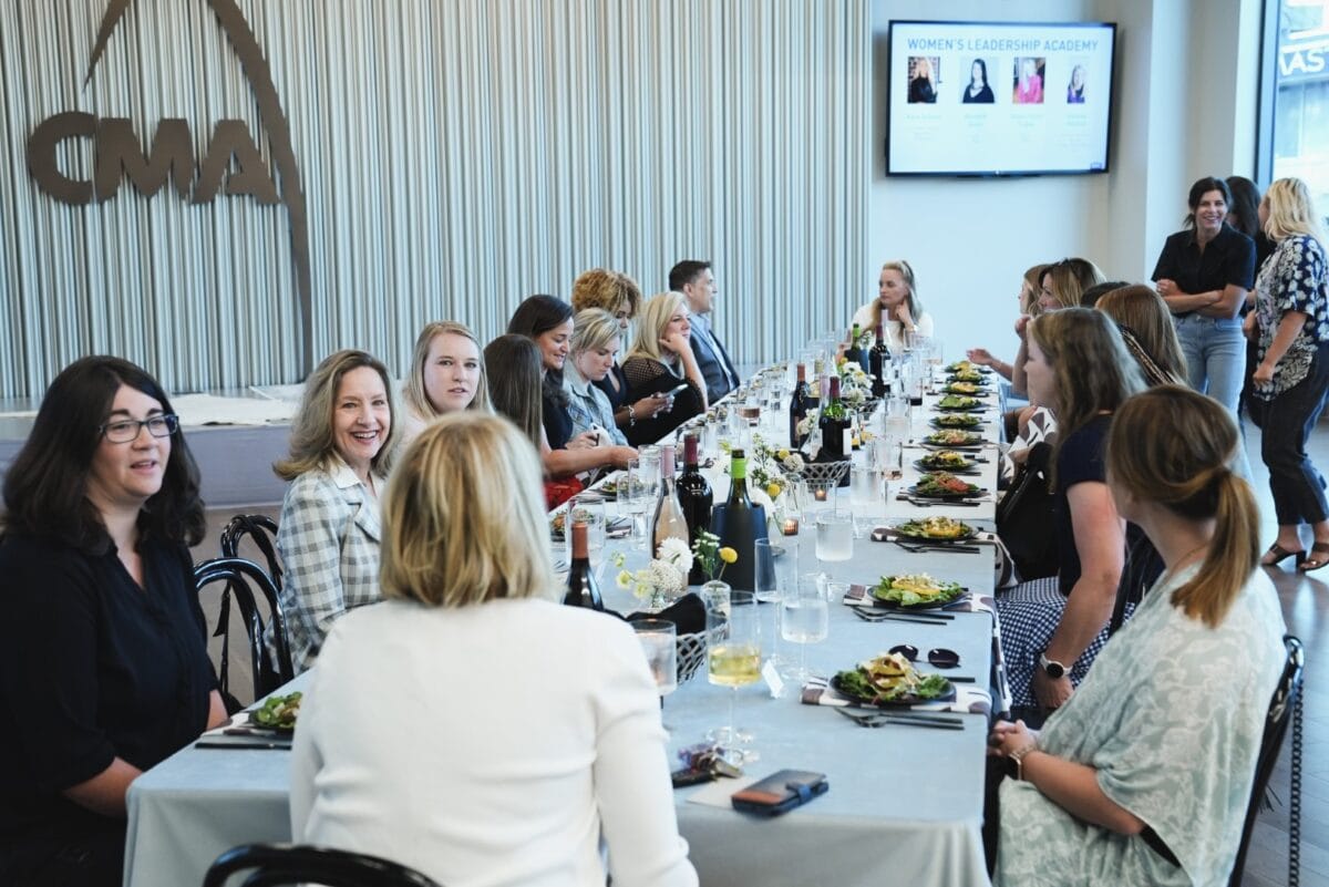Sarah Trahern and Tiffany Kerns speak at the Women’s Leadership Academy dinner Monday, July 11, 2022 at the CMA offices in Nashville.