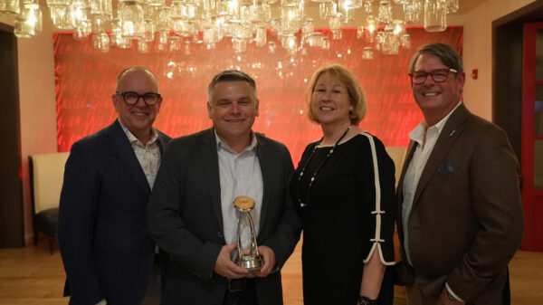 Dan Rogers receives the CMA Irving Waugh Award of Excellence during the CMA Board of Directors meeting in Washington, D.C. on March 28, 2023. (L-R) Charlie Morgan (Apple Music Programming Lead and CMA Board Chairman), Rogers, Sarah Trahern (CMA Chief Executive Officer) and Jay Williams (WME Nashville Co-Head and Partner and CMA Board member).Photo Credit: Amanda Eckard/CMA